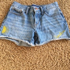 Denim shorts with embroidered patches
